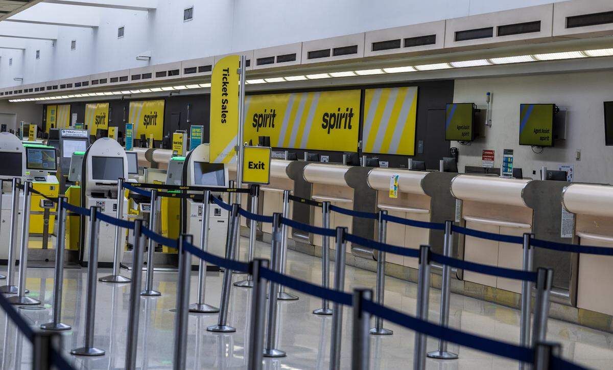 The deserted Spirit Airlines counters at the Fort Lauderdale airport after the company shut down on Saturday May 0, 2026.